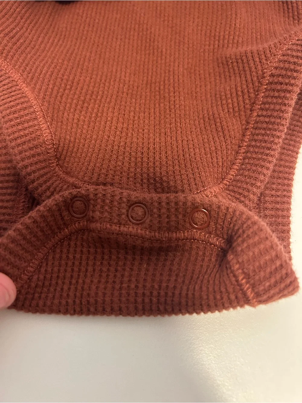 Rust Ruffle Neck Ribbed Baby Onesie